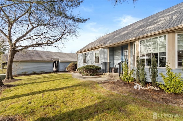 exterior space with a front yard