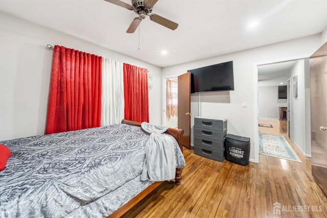 21 Coolidge Ave, East Brunswick, NJ 08816 - bedroom with wood finished floors, baseboards, recessed lighting, and ceiling fan