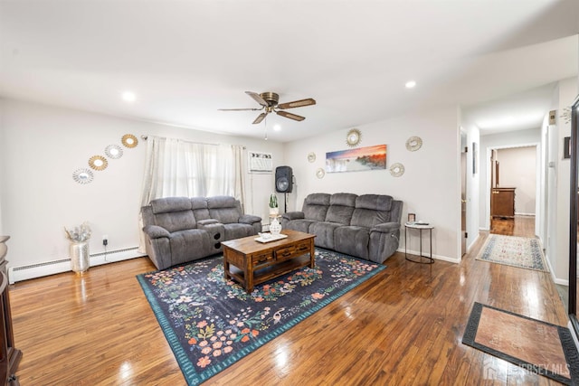21 Coolidge Ave, East Brunswick, NJ 08816 - living room featuring a ceiling fan, wood finished floors, recessed lighting, baseboard heating, and an AC wall unit