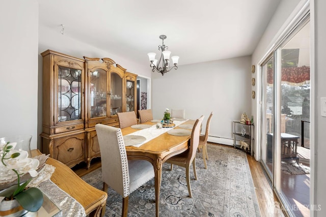 21 Coolidge Ave, East Brunswick, NJ 08816 - dining area featuring a chandelier and light wood-style floors