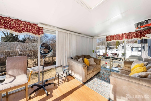 21 Coolidge Ave, East Brunswick, NJ 08816 - living room featuring wood finished floors and vaulted ceiling