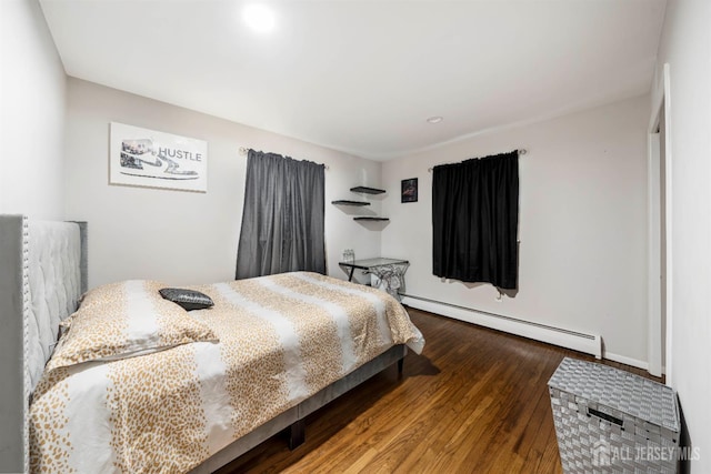 21 Coolidge Ave, East Brunswick, NJ 08816 - bedroom featuring a baseboard heating unit, wood finished floors, and recessed lighting