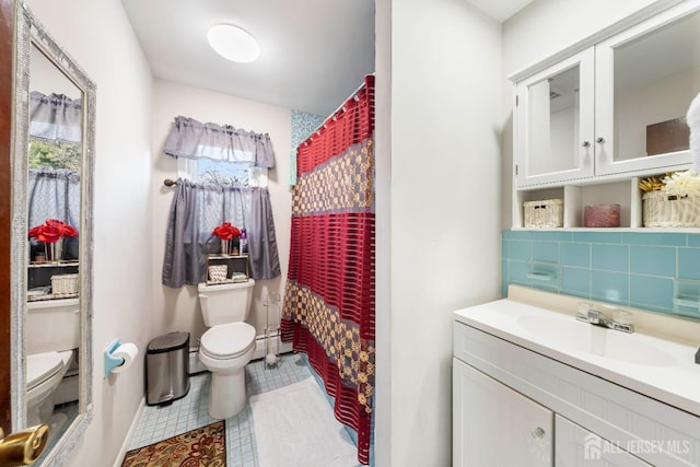 21 Coolidge Ave, East Brunswick, NJ 08816 - bathroom with toilet, vanity, and healthy amount of natural light