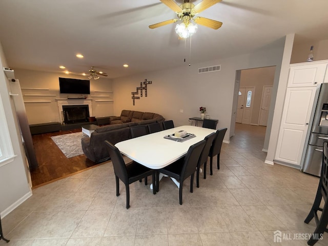 dining area with ceiling fan, light tile patterned floors, baseboards, and recessed lighting