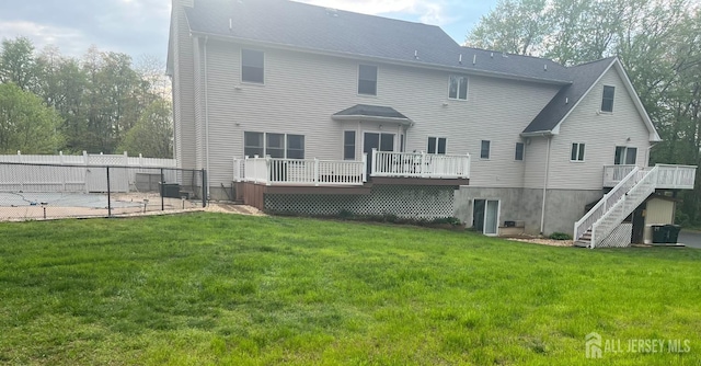 back of house with a deck, stairway, and central AC unit