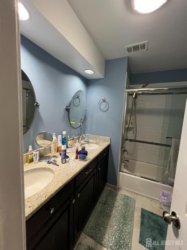 354 Burdock Ct, Readington, NJ 08887 - bathroom featuring double vanity and enclosed tub / shower combo