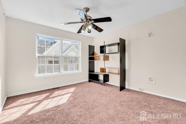 46 Prestwick Way, Edison, NJ 08820 - carpeted empty room with ceiling fan, baseboards, and a textured ceiling