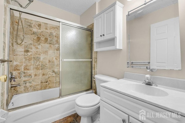 46 Prestwick Way, Edison, NJ 08820 - full bathroom with combined bath / shower with glass door, toilet, vanity, and a textured ceiling