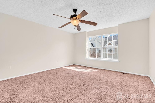 46 Prestwick Way, Edison, NJ 08820 - empty room with carpet floors, a textured ceiling, baseboards, and a ceiling fan