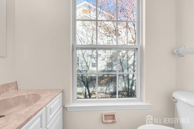46 Prestwick Way, Edison, NJ 08820 - half bath featuring toilet, vanity, and plenty of natural light