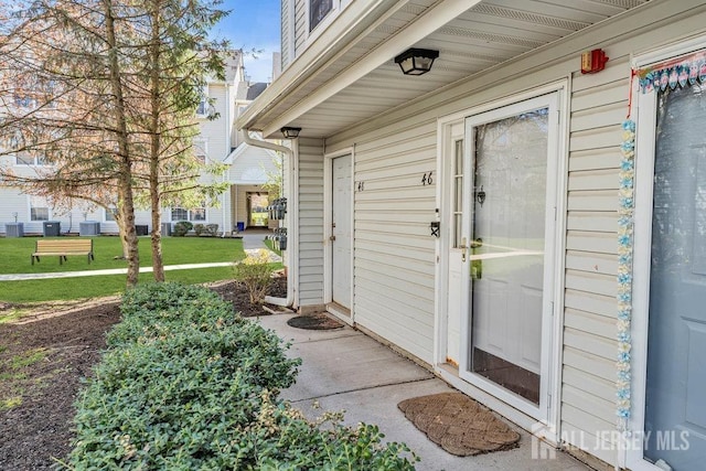 46 Prestwick Way, Edison, NJ 08820 - doorway to property with a lawn