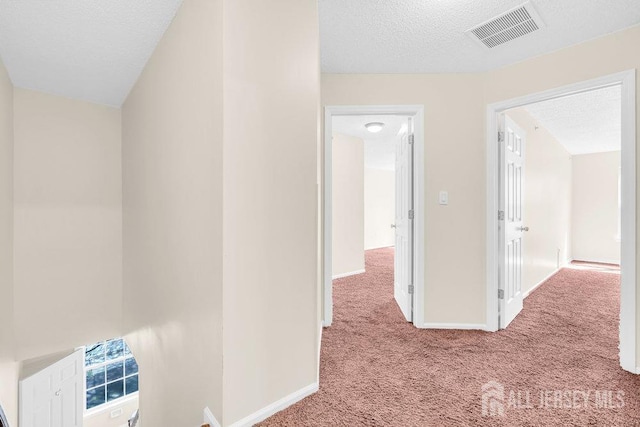 46 Prestwick Way, Edison, NJ 08820 - corridor with carpet, a textured ceiling, and baseboards