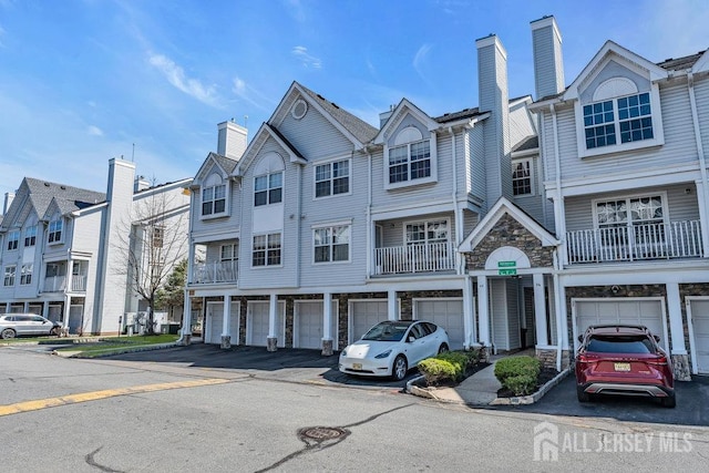 46 Prestwick Way, Edison, NJ 08820 - view of property featuring an attached garage and driveway
