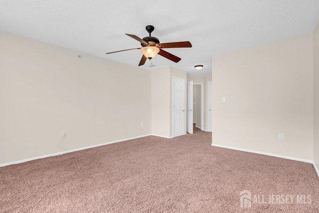 46 Prestwick Way, Edison, NJ 08820 - carpeted spare room featuring a ceiling fan, baseboards, and a textured ceiling