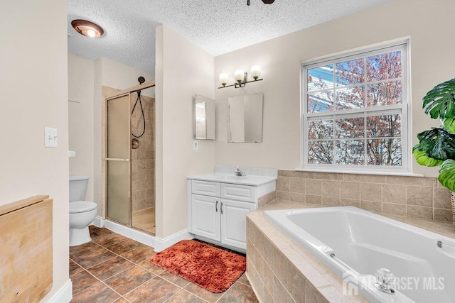 46 Prestwick Way, Edison, NJ 08820 - bathroom with a stall shower, toilet, a garden tub, vanity, and a textured ceiling