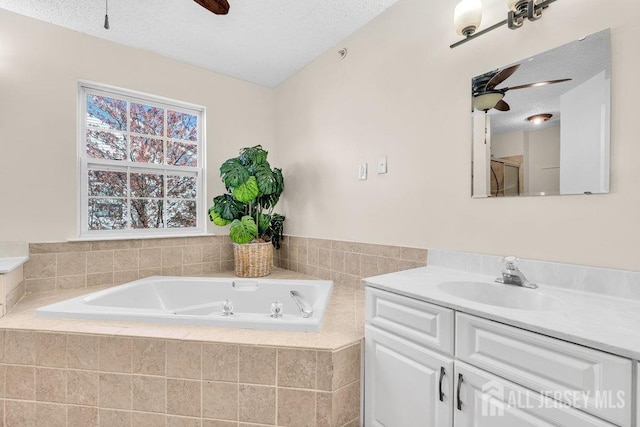 46 Prestwick Way, Edison, NJ 08820 - bathroom featuring a ceiling fan, a garden tub, vanity, and a textured ceiling