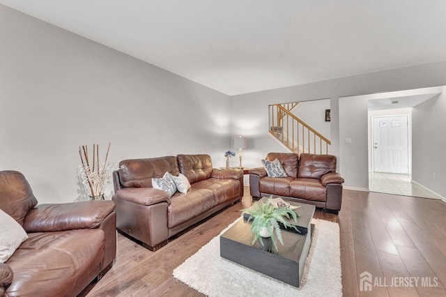 living room with light hardwood / wood-style floors