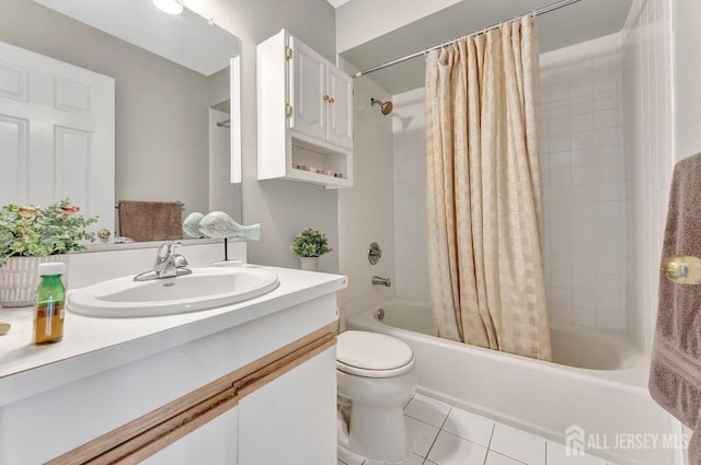 full bathroom with tile patterned floors, vanity, toilet, and shower / tub combo