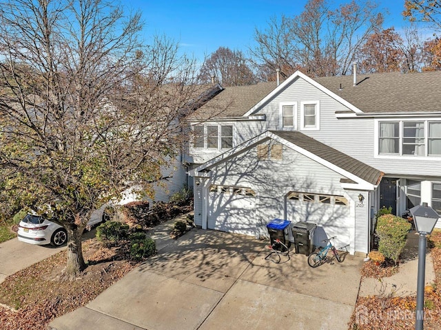 view of side of property featuring a garage