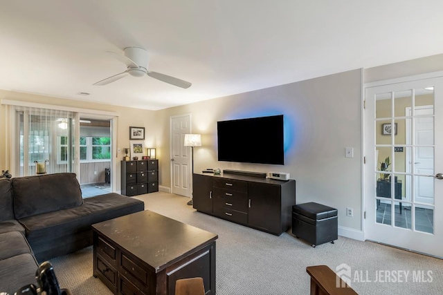117 Osceola Ave, Middlesex, NJ 08846 - living area with a ceiling fan and light carpet