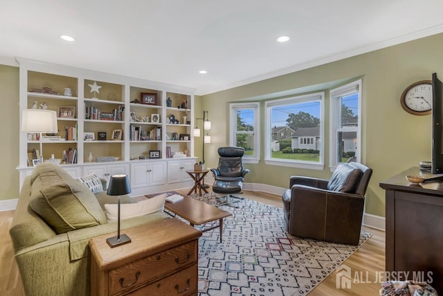 117 Osceola Ave, Middlesex, NJ 08846 - living area featuring light wood-style floors, recessed lighting, and ornamental molding