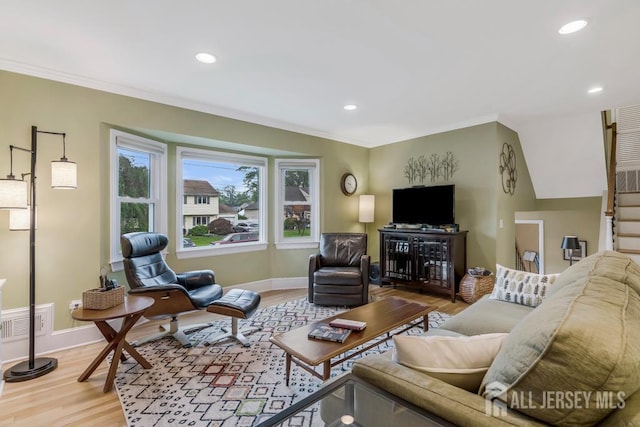 117 Osceola Ave, Middlesex, NJ 08846 - living area featuring light wood-type flooring, recessed lighting, and crown molding