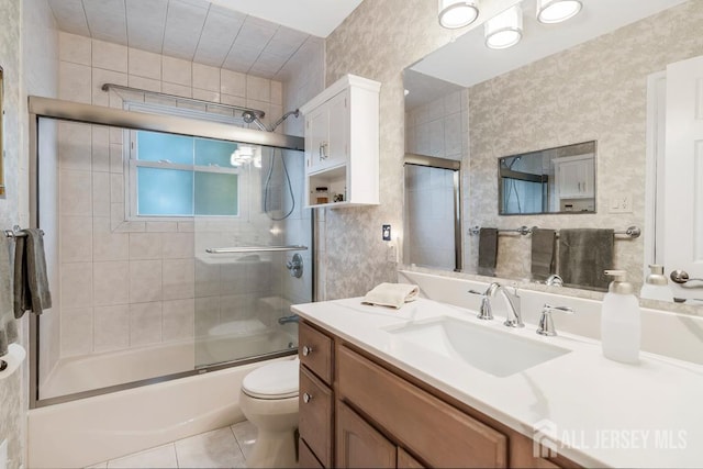 117 Osceola Ave, Middlesex, NJ 08846 - bathroom featuring vanity, shower / bath combination with glass door, and tile patterned floors