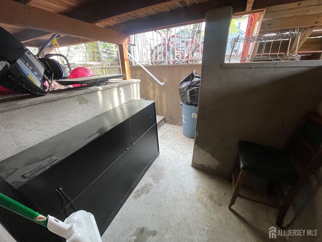 72 Comstock St, New Brunswick, NJ 08901 - misc room featuring unfinished concrete flooring and plenty of natural light