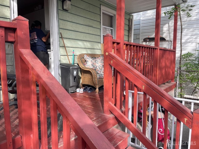 wooden deck with a porch