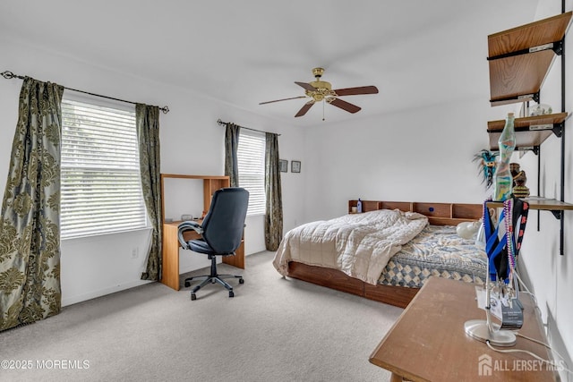 11 Patio Ct, Monroe, NJ 08831 - carpeted bedroom with an office area and a ceiling fan