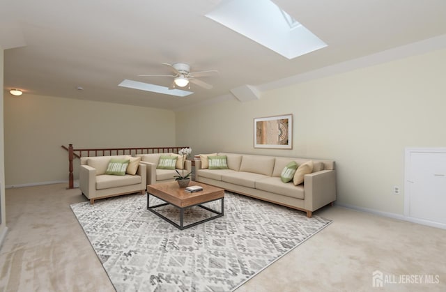 52 Fair Acres Ct, South Brunswick, NJ 08540 - living room featuring a skylight, light colored carpet, and ceiling fan