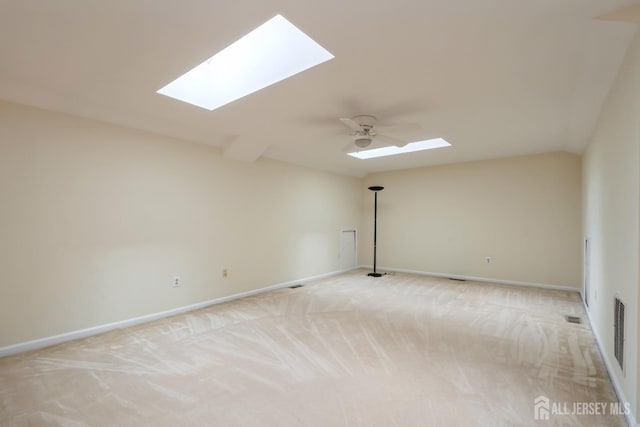 52 Fair Acres Ct, South Brunswick, NJ 08540 - spare room featuring a skylight, light colored carpet, and a ceiling fan