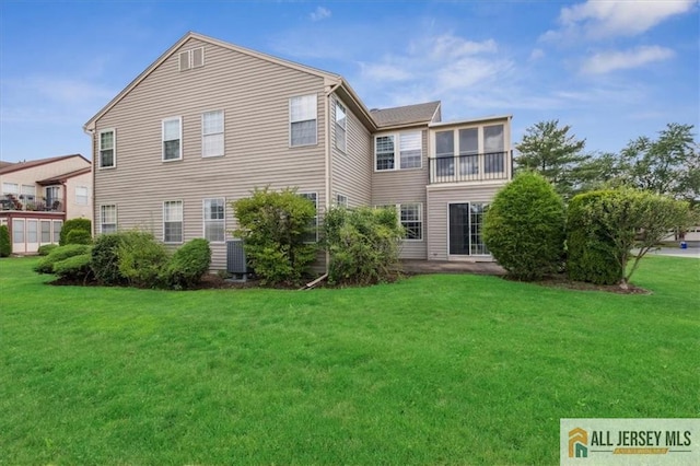 57 Yorkshire Dr Unit 57B, Jamesburg, NJ 08831 - rear view of house featuring a yard and a sunroom