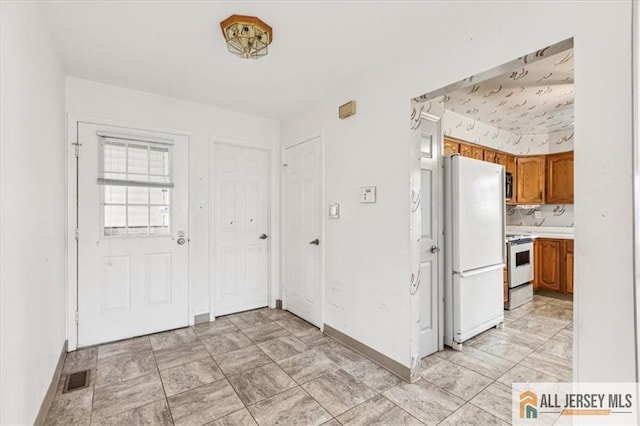 57 Yorkshire Dr Unit 57B, Jamesburg, NJ 08831 - foyer entrance featuring baseboards