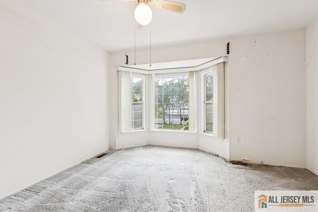 57 Yorkshire Dr Unit 57B, Jamesburg, NJ 08831 - unfurnished room with carpet flooring and a ceiling fan