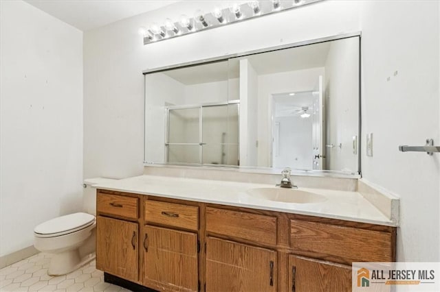 57 Yorkshire Dr Unit 57B, Jamesburg, NJ 08831 - full bathroom featuring vanity, a shower stall, tile patterned flooring, and a ceiling fan