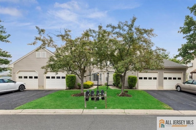 57 Yorkshire Dr Unit 57B, Jamesburg, NJ 08831 - obstructed view of property featuring a garage, a front yard, and driveway