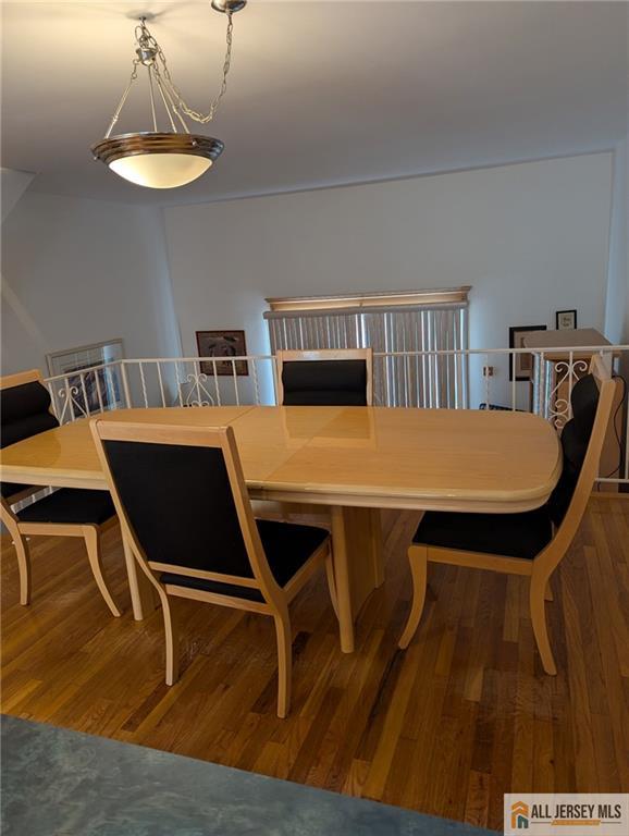 41 Village Rd, Sea Bright, NJ 07760 - dining space featuring wood finished floors
