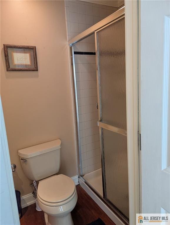 41 Village Rd, Sea Bright, NJ 07760 - full bath featuring a shower stall, toilet, and baseboards