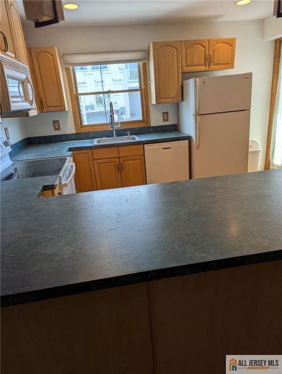 41 Village Rd, Sea Bright, NJ 07760 - kitchen with white appliances, a sink, light brown cabinetry, dark countertops, and recessed lighting