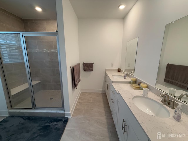 43 Starlight Dr, Monroe, NJ 08831 - full bathroom featuring a shower stall, double vanity, baseboards, and recessed lighting