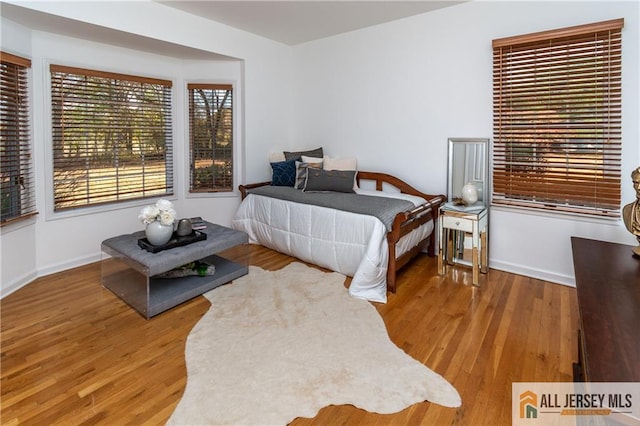 bedroom featuring hardwood / wood-style flooring