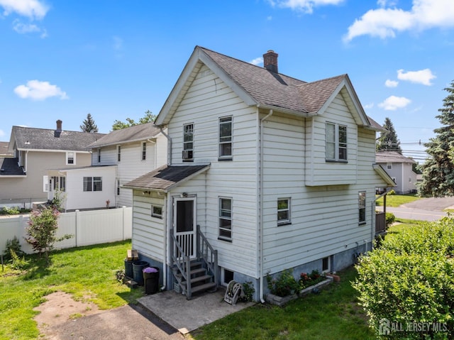 203 Lincoln Blvd, Middlesex, NJ 08846 - back of house featuring entry steps, a chimney, and a shingled roof