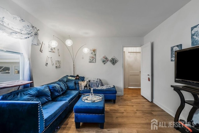 living room with dark wood-type flooring