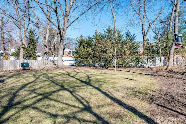 view of yard with fence