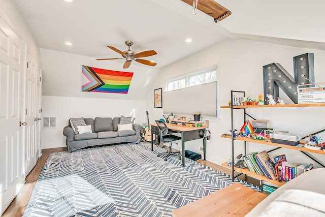 home office with visible vents, ceiling fan, vaulted ceiling, recessed lighting, and wood finished floors