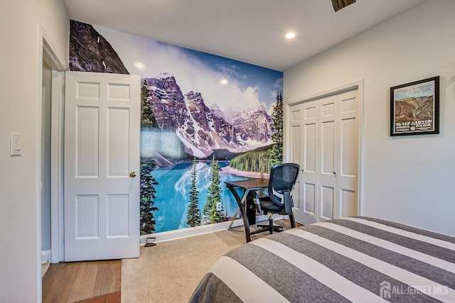 bedroom with a closet and recessed lighting