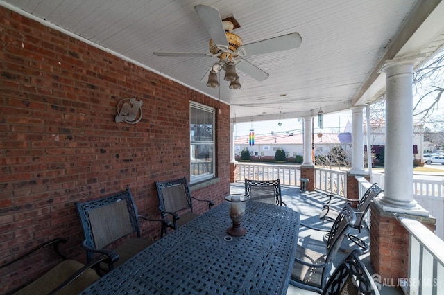 view of patio / terrace with ceiling fan and outdoor dining area