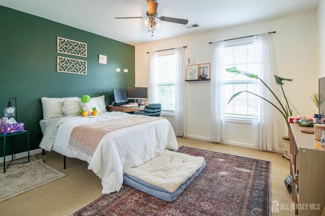 23 Keswick Cir, Monroe, NJ 08831 - bedroom with carpet floors, an accent wall, ceiling fan, and baseboards