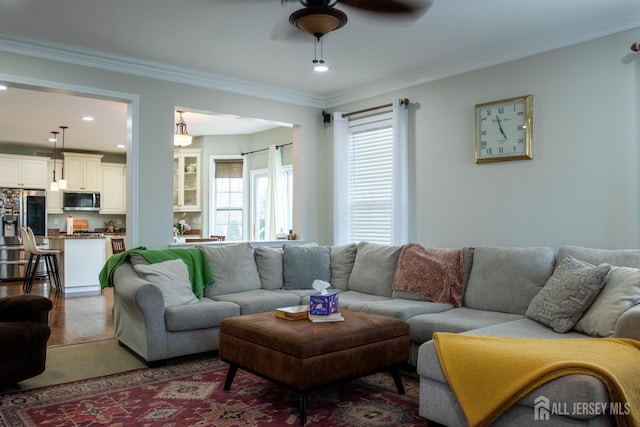 23 Keswick Cir, Monroe, NJ 08831 - living area featuring a ceiling fan, wood finished floors, ornamental molding, and recessed lighting